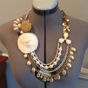 White chain and gold and pearl necklace